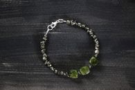 A Silver Stone Bracelet in Close-up Photography