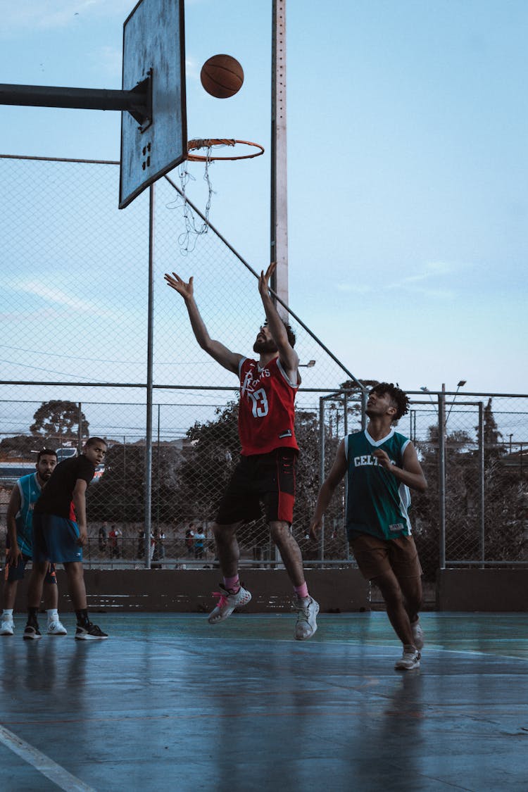 Men Playing Basketball