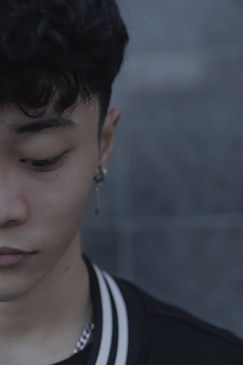 Close-Up Shot of a Man Wearing Earring