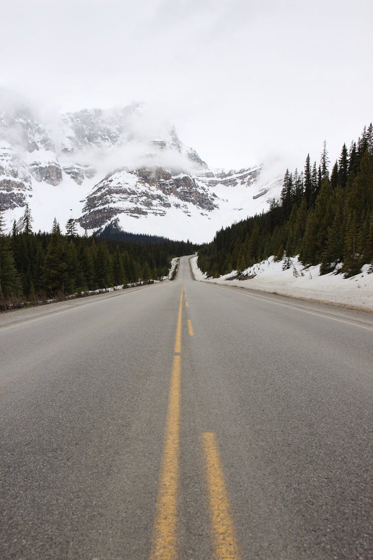 Road Going To Snow Covered Mountain