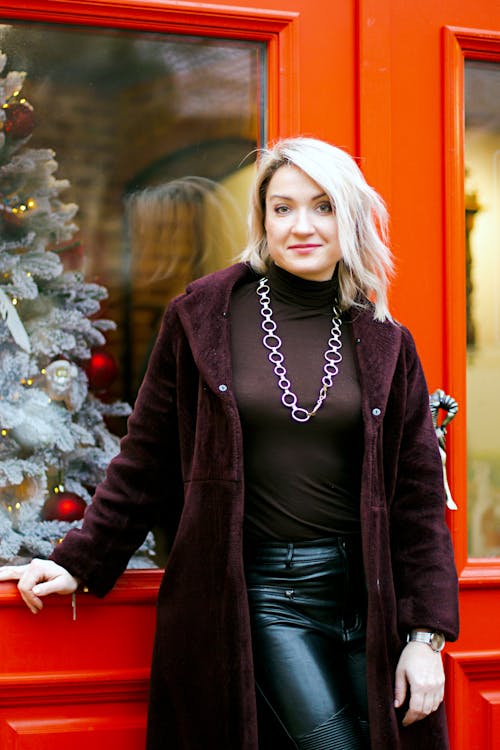 Photo of a Woman Wearing a Long Coat