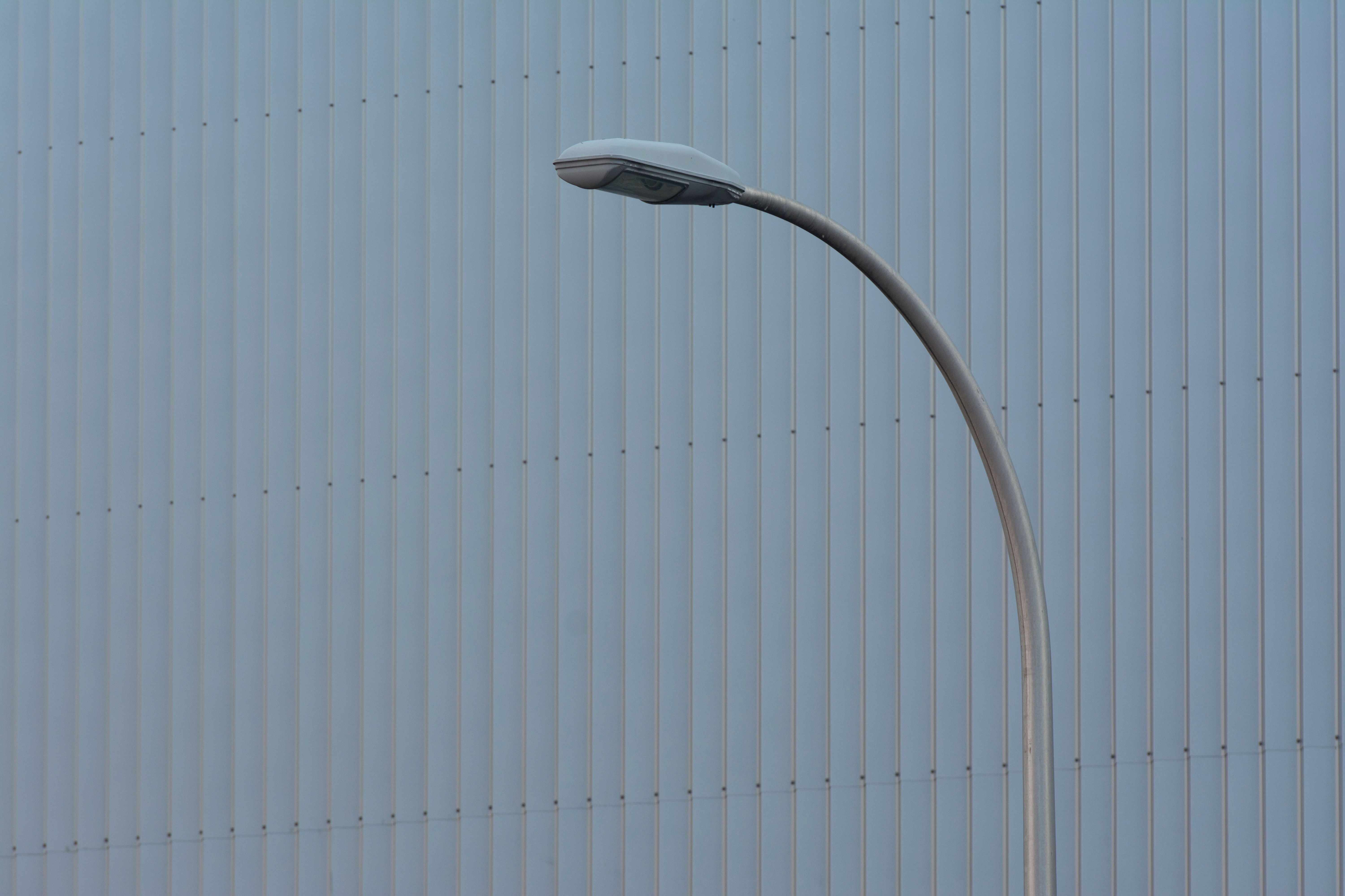 A close-up shot of a white desk lamp