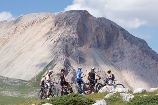Group of Mountain Bikers Parked near the Mountains