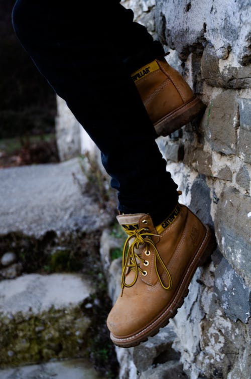 Free Person Wearing Brown Boots Stock Photo