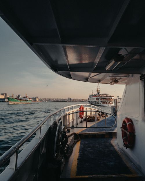 Free View from a ferry boat cruising on the Bosphorus Strait in Istanbul during the day. Stock Photo