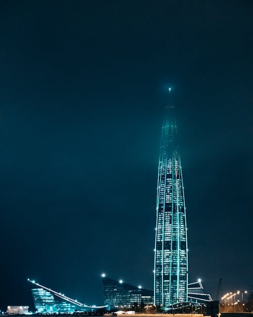 Illuminated High Rise Tower at Night