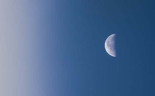 Half Moon in Blue Sky