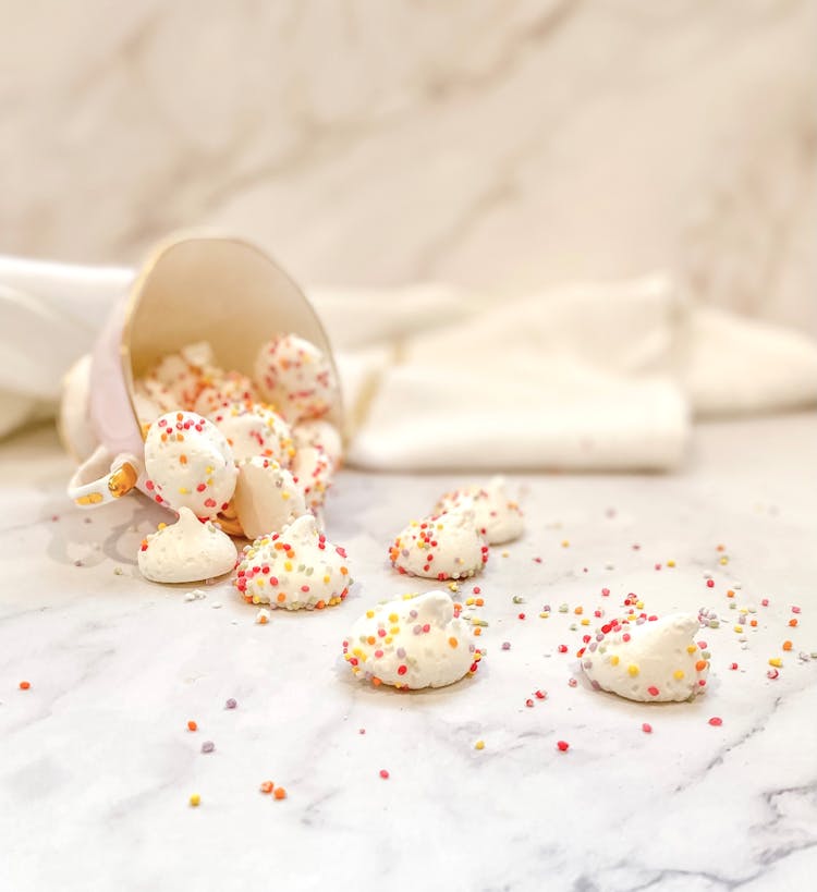 Meringues Spilling Out Of A Cup