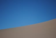 Sand Dune against Blue Sky