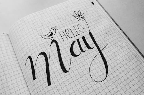 Free White Graphing Paper With Hello May Text Stock Photo