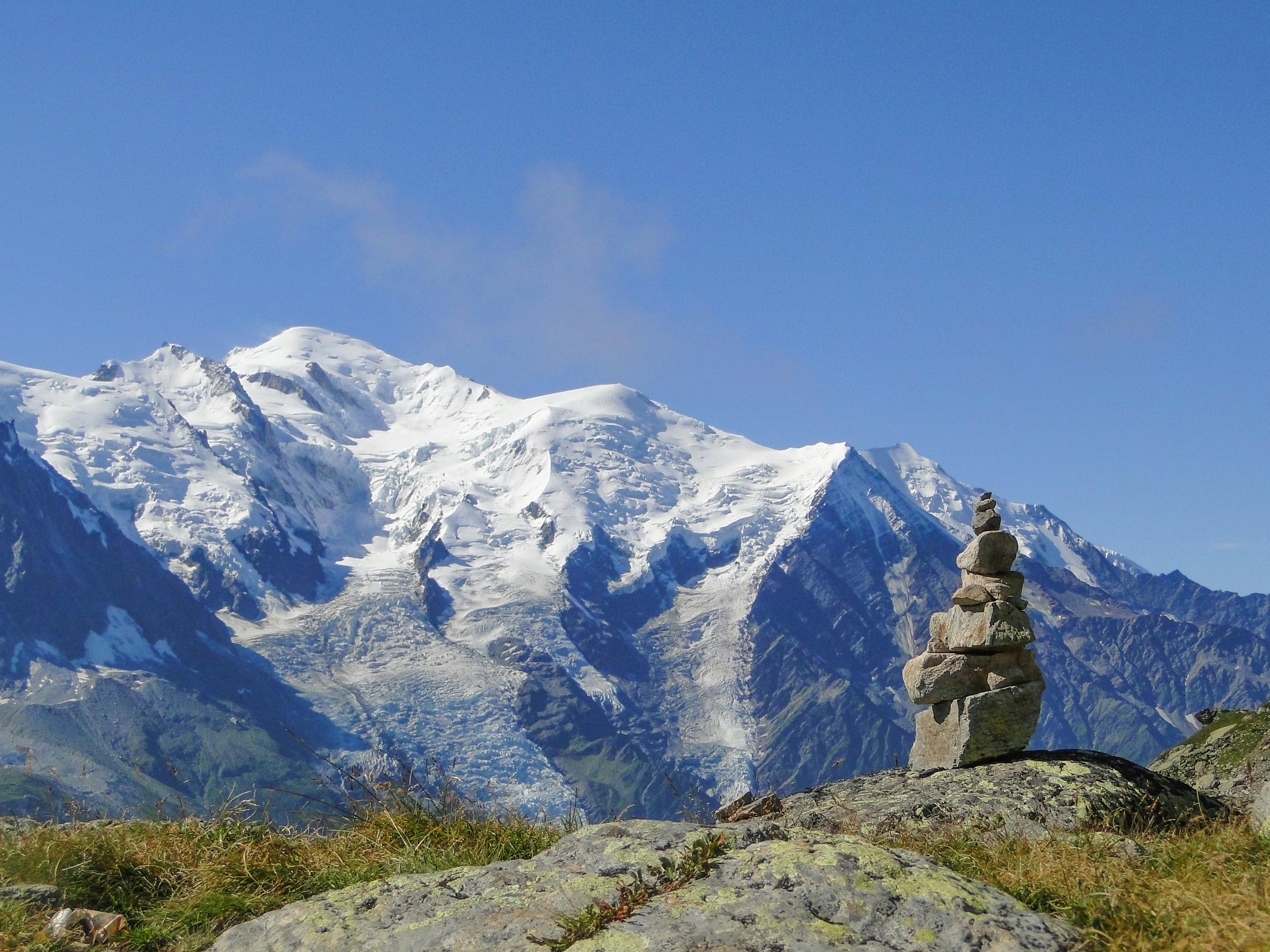 High-mountainous Sharp Rocks Against The Blue Sky And White Clouds.  Caucasus Stock Photo, Picture and Royalty Free Image. Image 87097392.