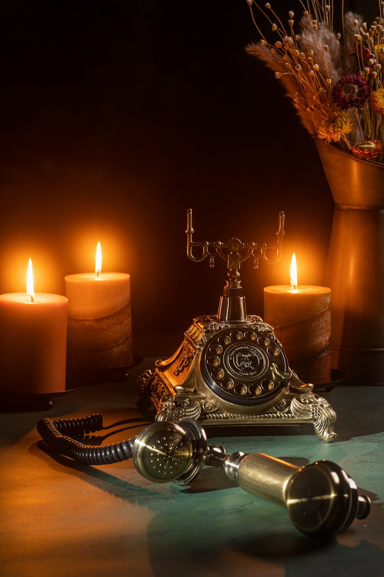 Golden Telephone And Wax Candles