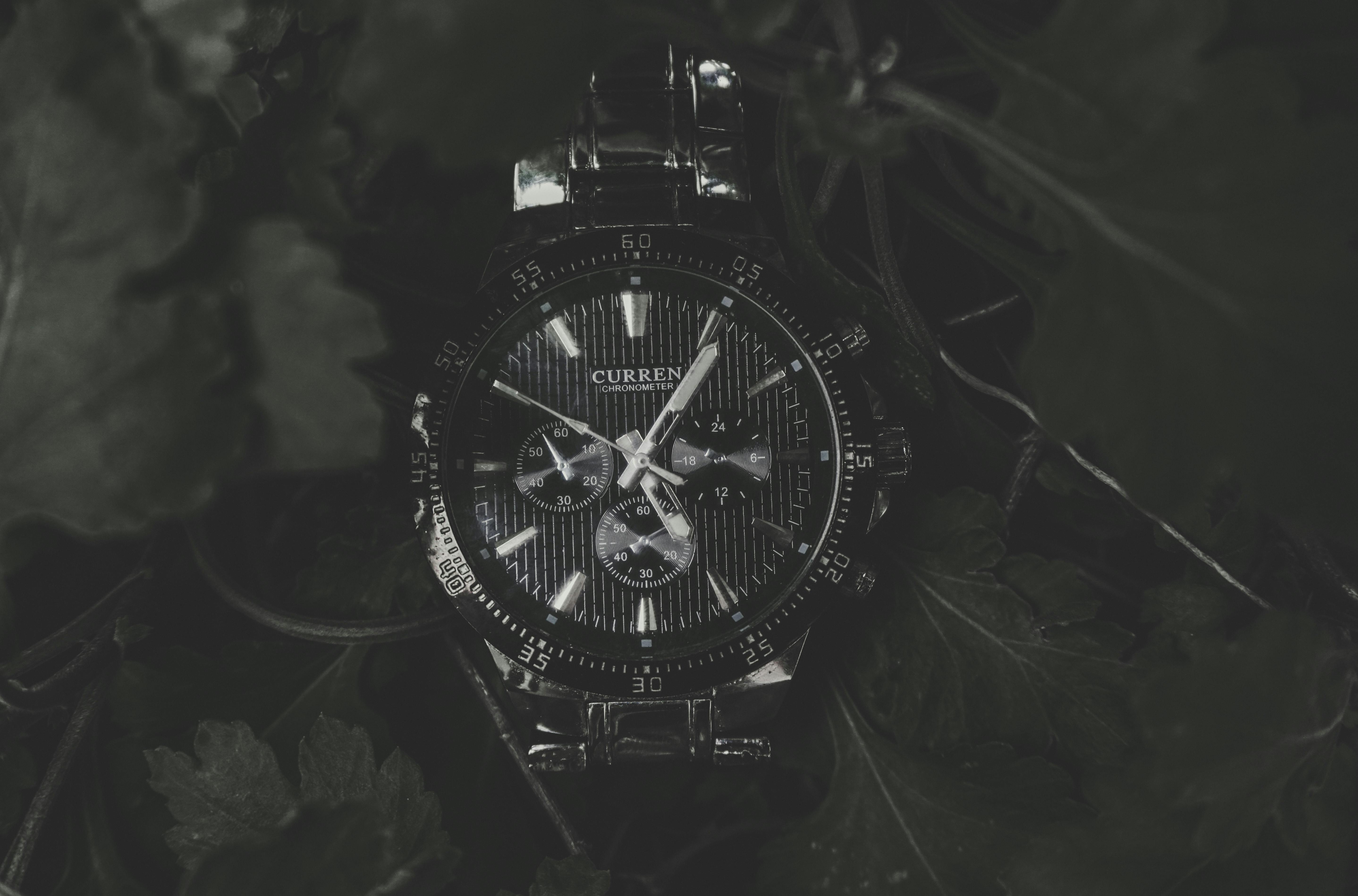 round black current chronograph watch with link bracelet