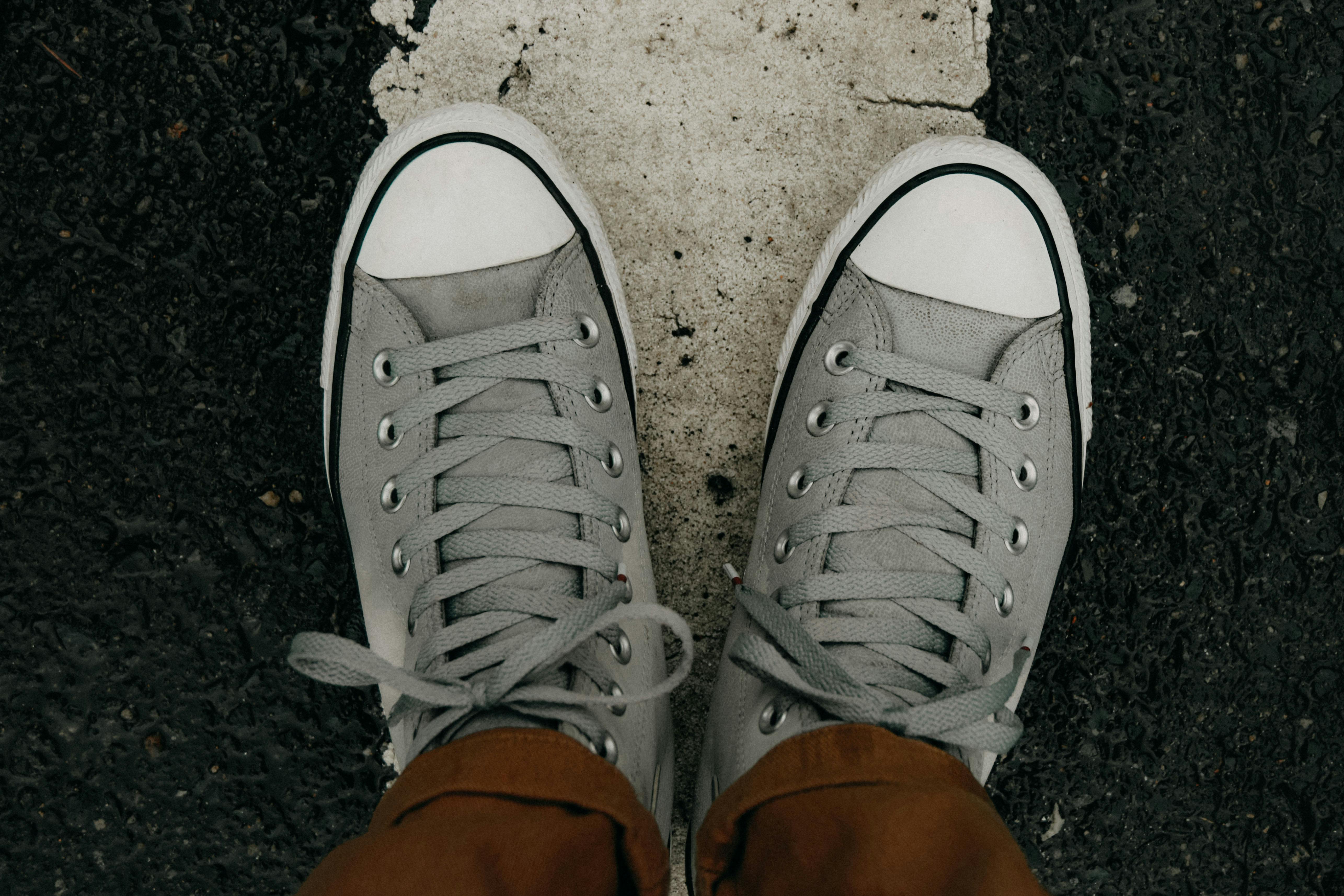 Top View Photo of Person Wearing Silver Shoes · Free Stock Photo