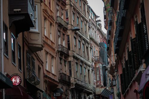 Free Explore the rustic architecture lining a narrow street in Istanbul, showcasing the city's historic charm. Stock Photo