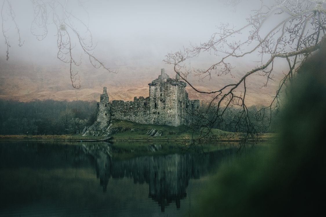 Old Stone Castle on Hill Reflection in Water · Free Stock Photo