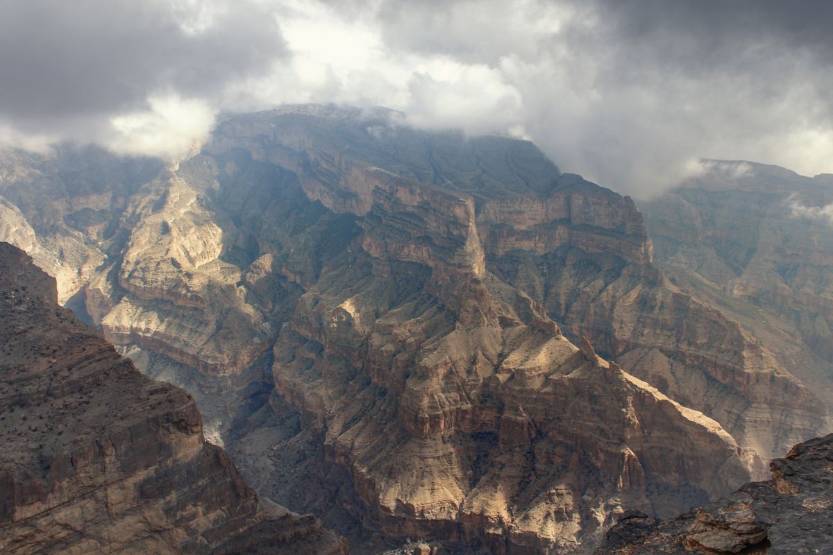 Aerial view of the bare ridges and deep canyons of Jebel Shams