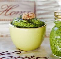Green basil pesto in a bowl — photo by Elimira Lotti on Pexels