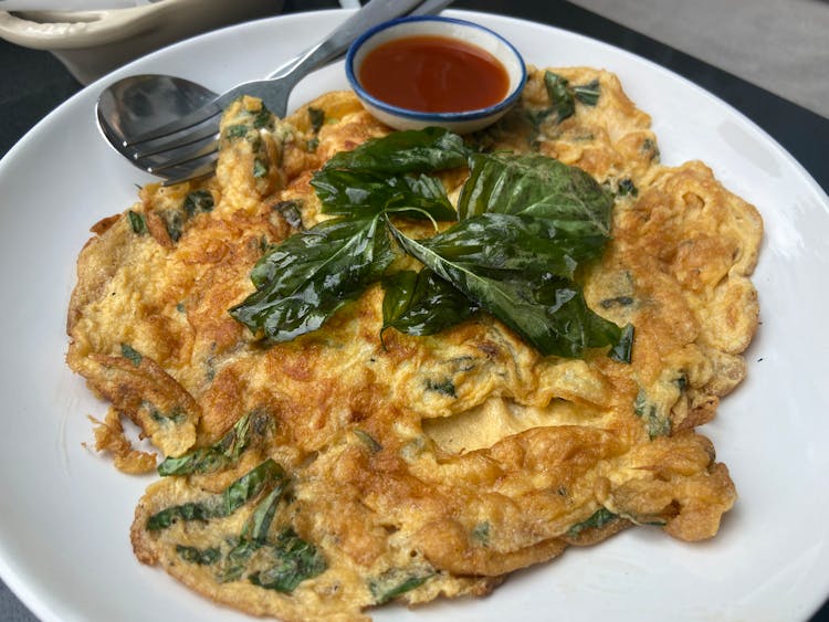 Spinach Omelette On White Ceramic Plate