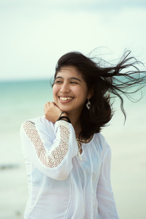 Free Smiling Woman in White Long Sleeve Shirt Stock Photo