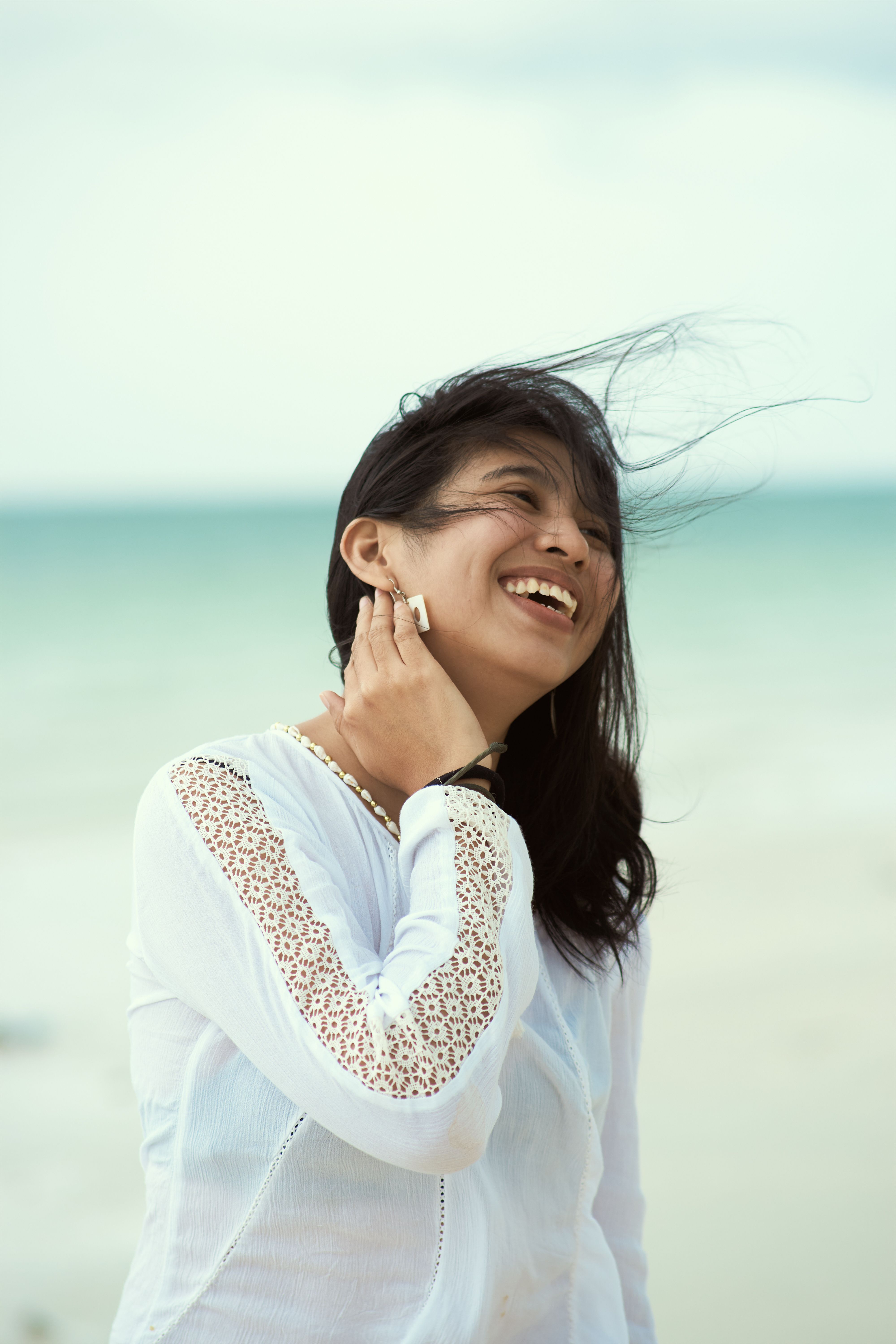 A Woman in White Long Sleeve Shirt · Free Stock Photo