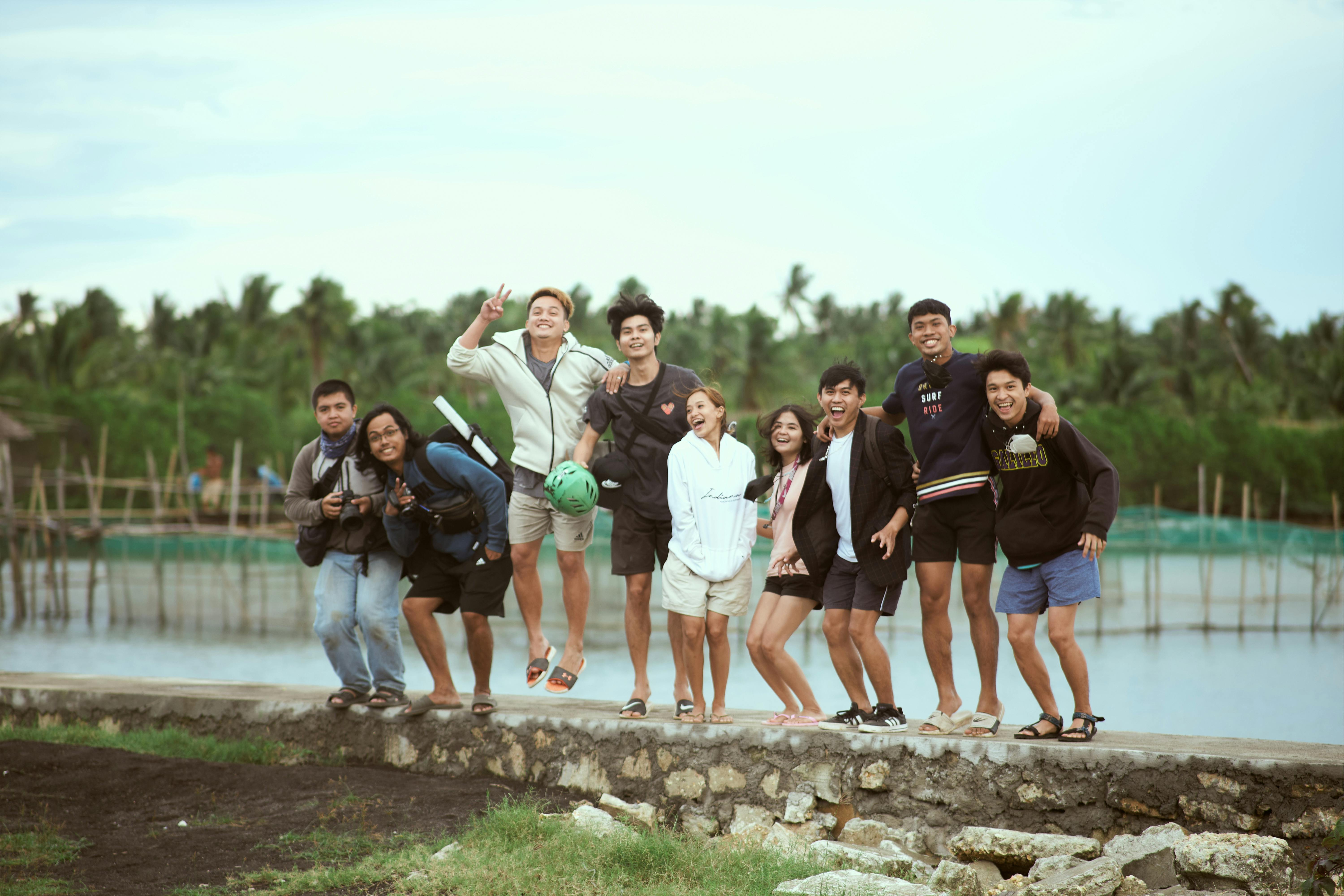 Happy group of travelers enjoying a trip