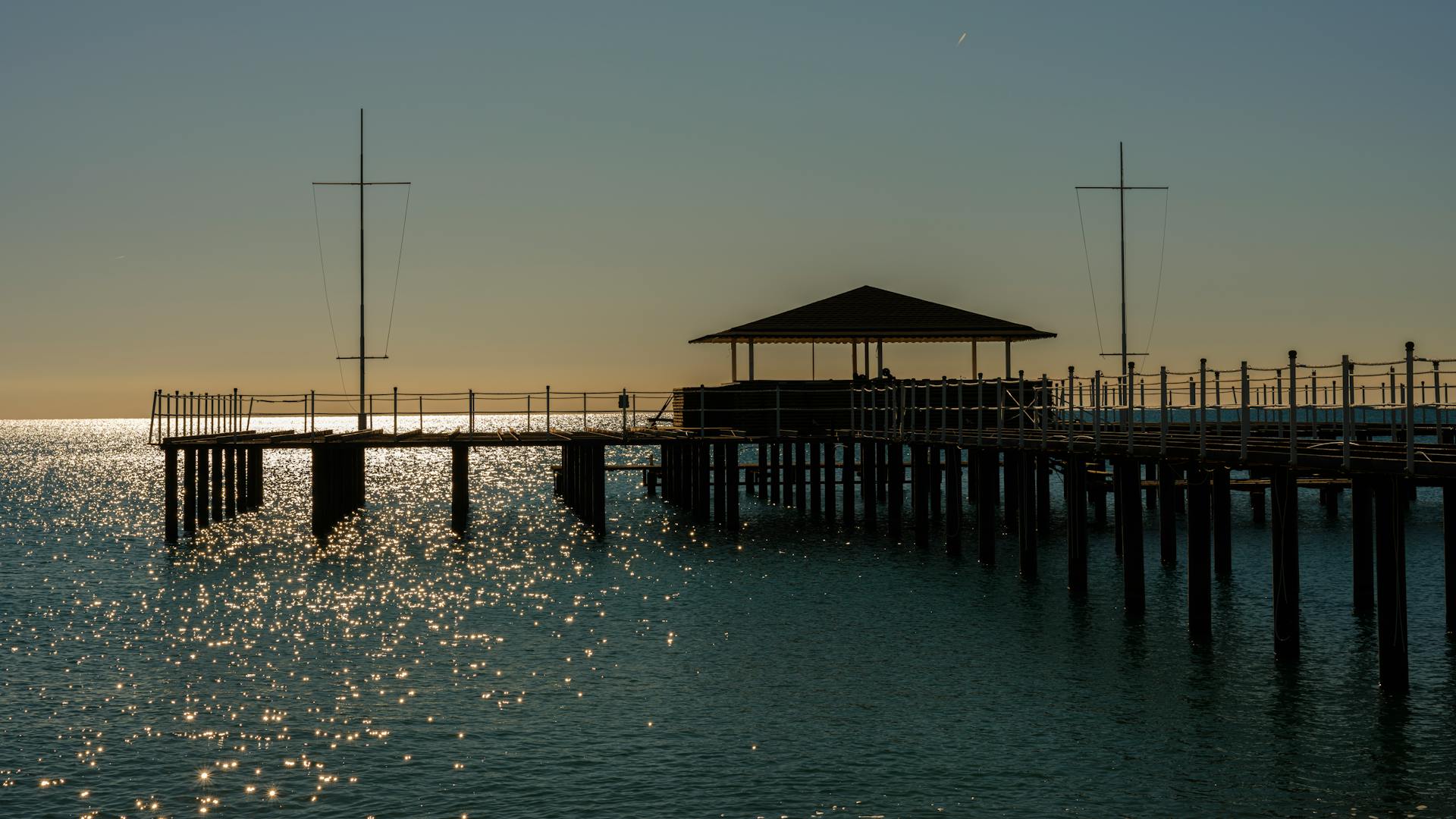 A Wooden Dock with Roof in the River