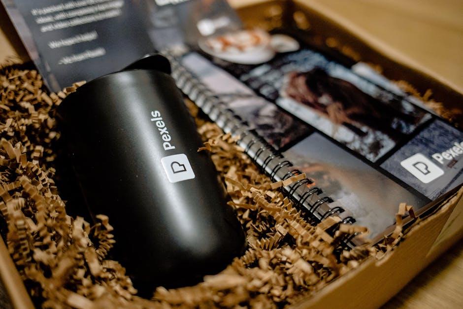 curated gift sets featuring notebooks and pens - christmas gift ideas for employees on a budget