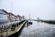 Blue Boat on Dock