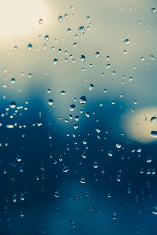 Free Water Droplets on Glass Panel Stock Photo