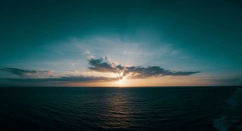Free Stunning sunset over the Gulf of Mexico with dramatic sky and ocean view, capturing tranquility and beauty. Stock Photo