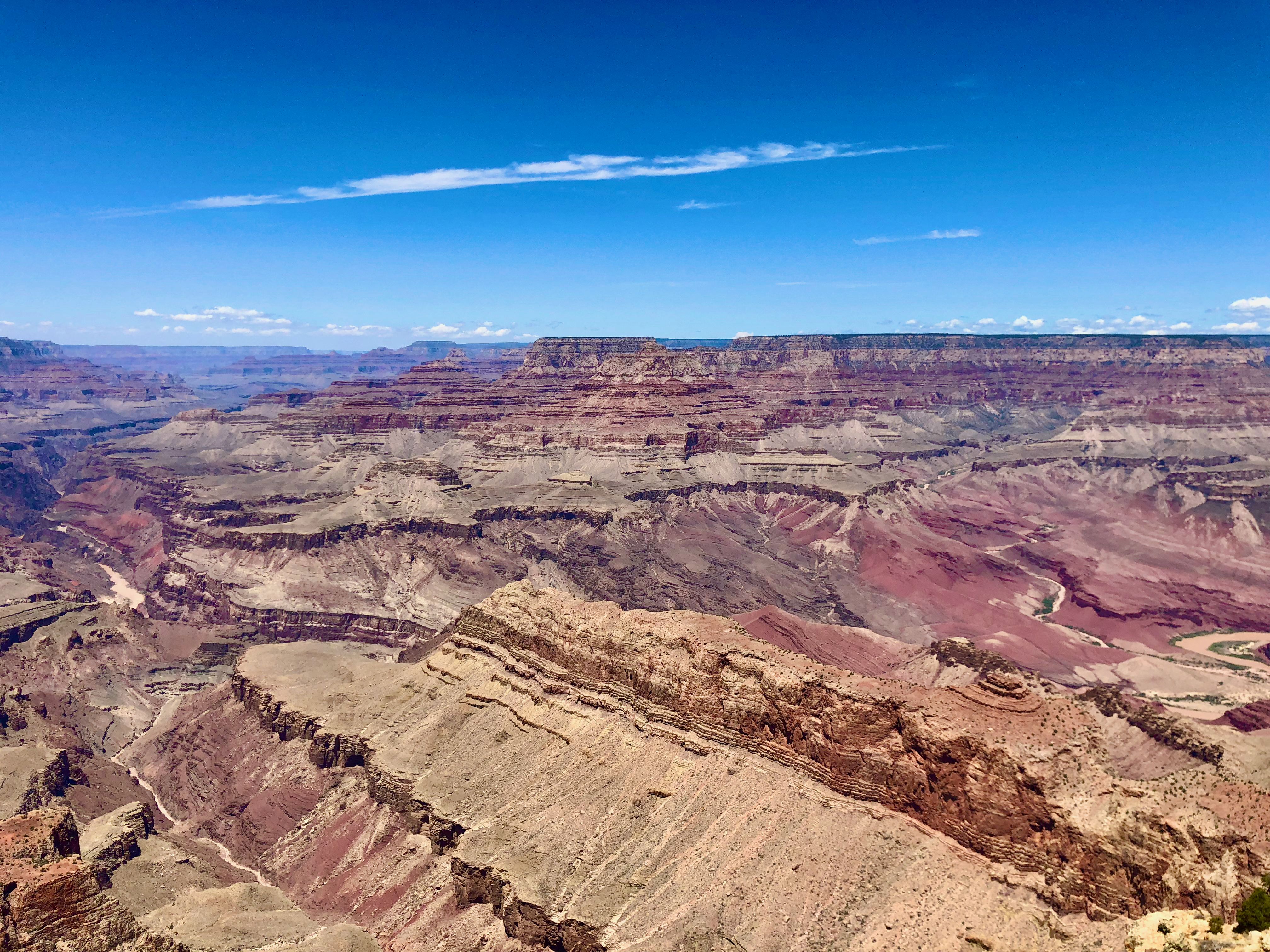 Ultimate Grand Canyon Tour by Helicopter Review: Soaring Over America's Most Iconic Natural Wonder Review 2026 - A stunning aerial view of the Grand Canyon showcasing its majestic rock formations under a clear blue sky.