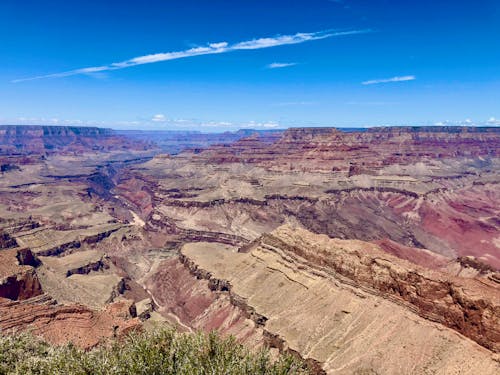 Brown and Gray Mountains Under Blue Sky