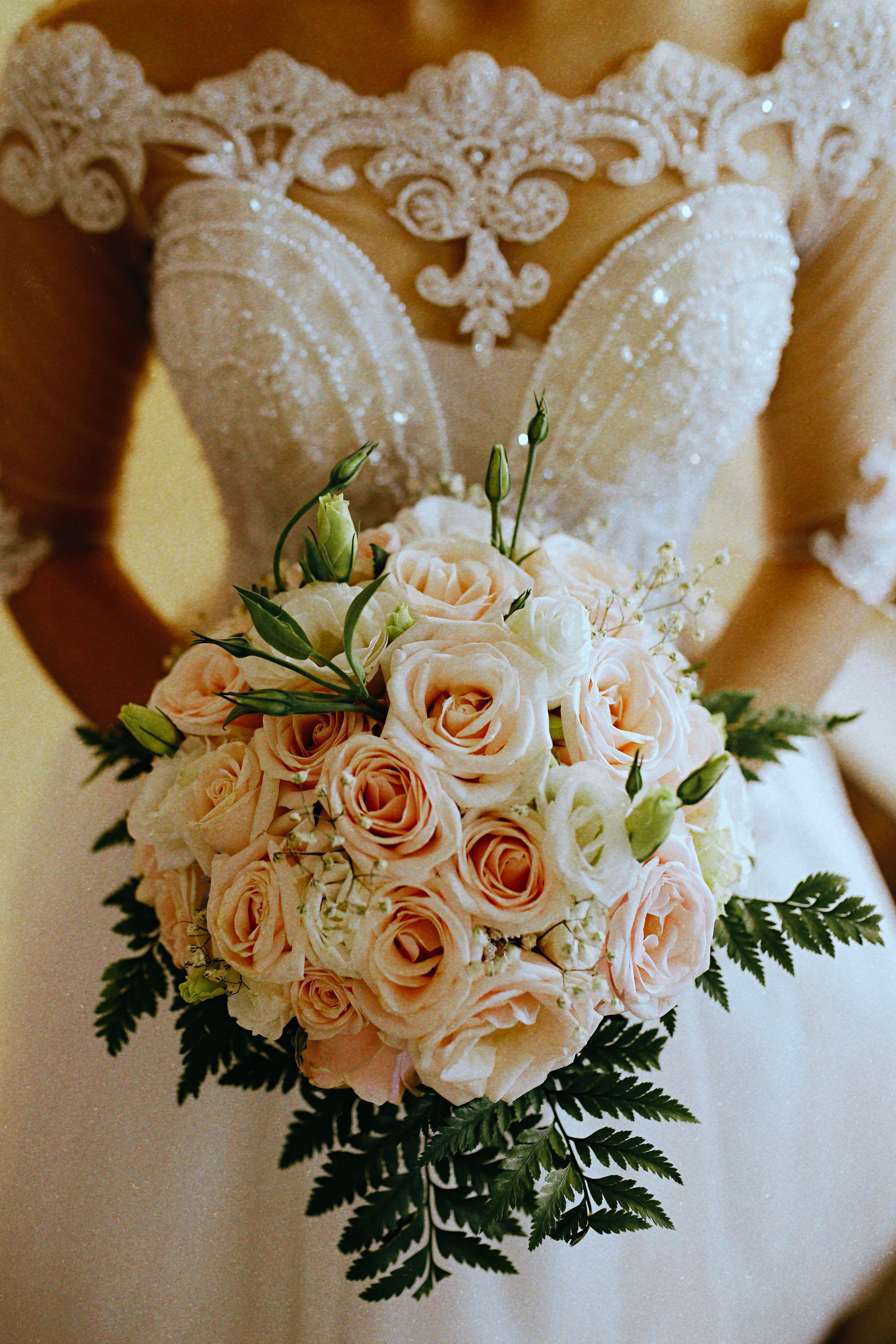 Bride in Wedding Dress Holding Bouquet · Free Stock Photo