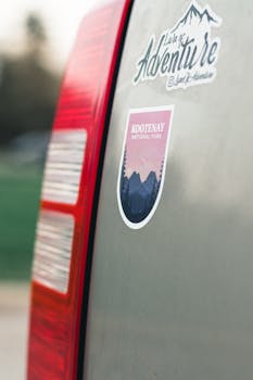 Close-up of a Kootenay National Park sticker on a vehicle near a tail light in Ottawa, Ontario.