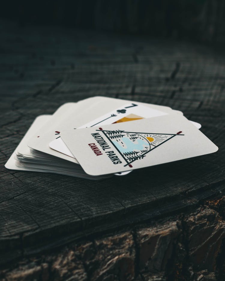 A Deck Of Playing Cards On The Table