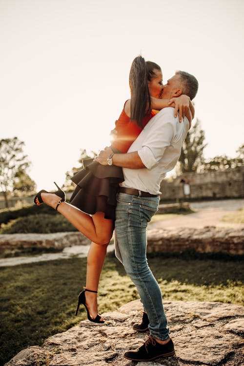 Free A Romantic Couple Kissing Stock Photo