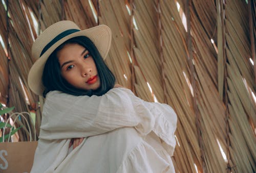 Woman Wearing Brown Hat