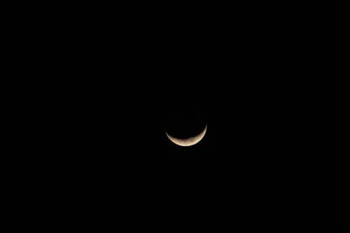 Crescent Moon in Close Up Photography