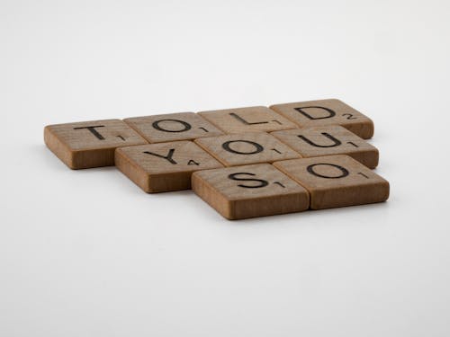A Told You So Quote on Wooden Scrabble Pieces