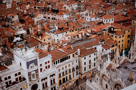 Spectacular aerial view of Venice's unique rooftops and architectural style from above.