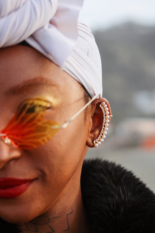 A Woman Wearing a White Head Wrap