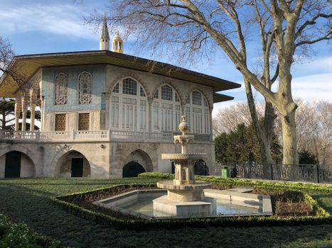 Baghdad Kiosk near Bare Tree