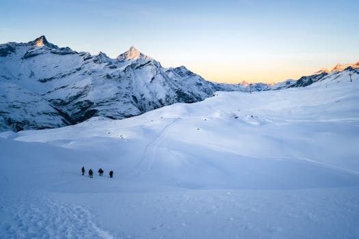 A stunning snowy mountain view in Zermatt, perfect for winter sports enthusiasts enjoying the serene environment.