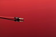 Red and Black Metal Tool