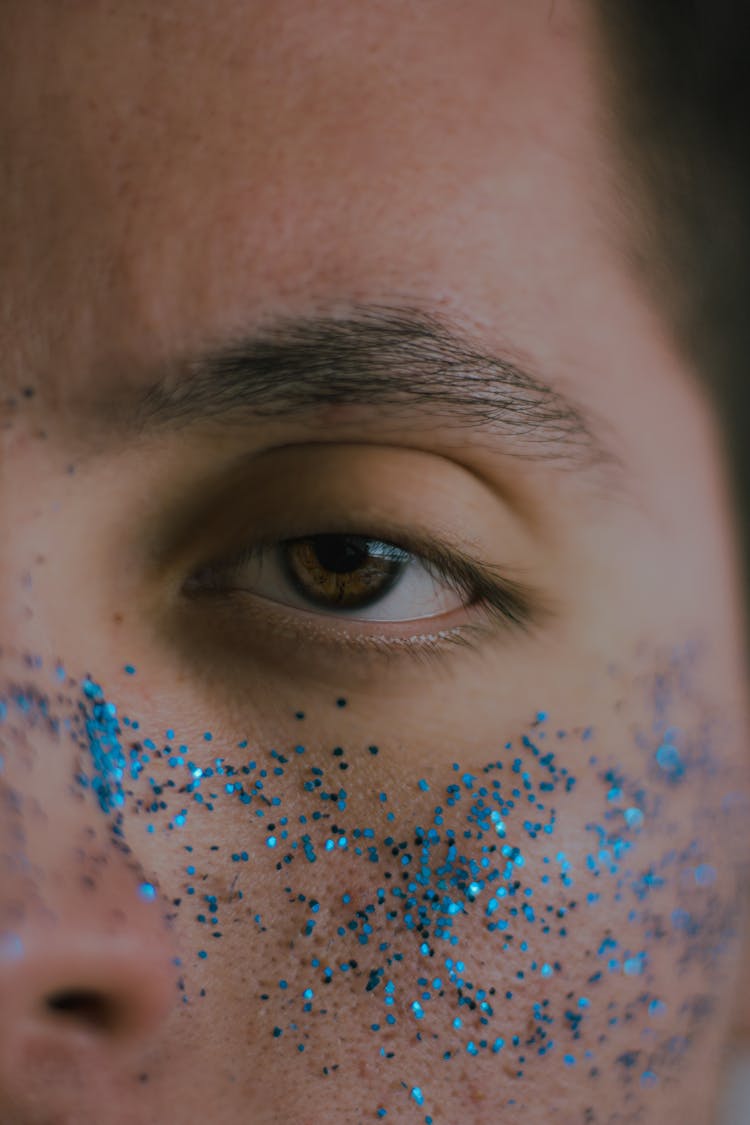 Close-up View Of Glitter On Face