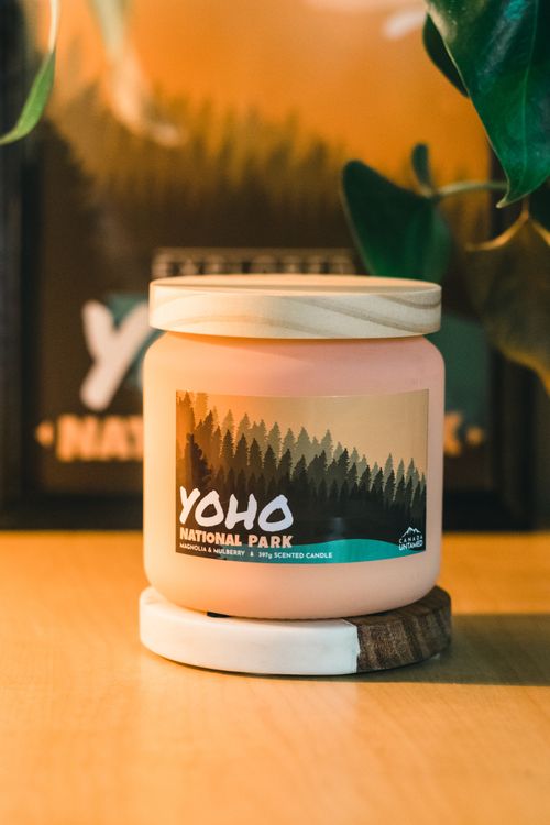 Free A beautifully presented Yoho National Park scented candle with a rustic wooden lid. Stock Photo