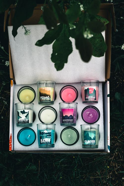 Free Assorted scented candles inspired by Canadian landscapes in a decorative box. Stock Photo