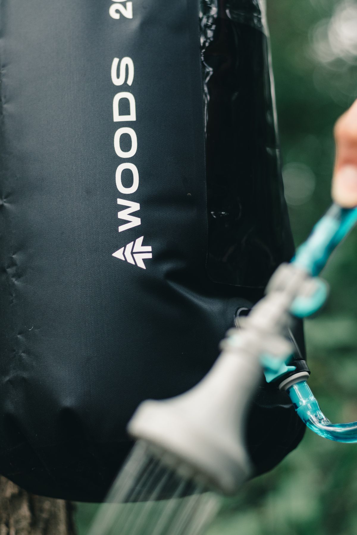Portable camping shower water hose and outdoor setup