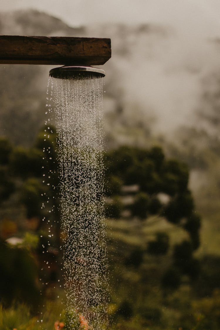 Falling Water Drops From Shower 